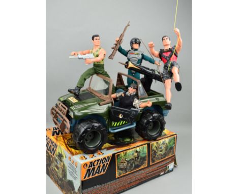 A BOXED HASBRO ACTION MAN 4 X 4, appears complete with all accessories, instructions and part used decal sheet, minor scratch