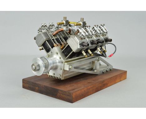 A HANDBUILT V8 4 STROKE MODEL AEROPLANE ENGINE, built by Gordon Williams of Aldridge, 24cc petrol engine, said to be in worki