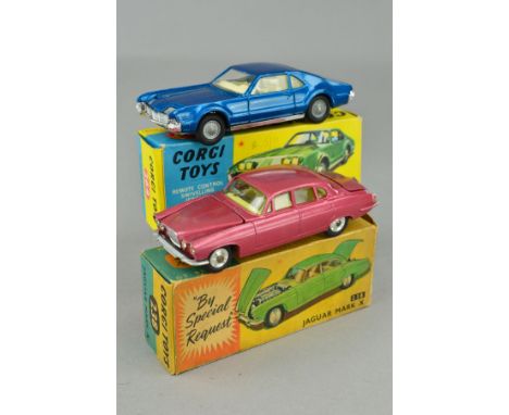 A BOXED CORGI TOYS JAGUAR MARK X, No.238, metallic cerise with lemon interior, complete with both pieces of luggage, very lig