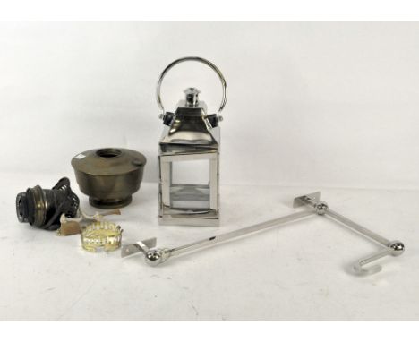 An Aladdin lamp and a contemporary lantern with hanging bracket 