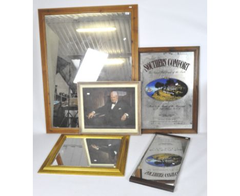 A Southern Comfort advertising mirror, framed, 90cm x 65cm, three further modern mirrors and a print of Churchill