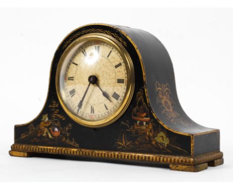 A Hamburg American Clock Company, lacquered Napolean's hat shaped mantel clock, with ivory coloured dial and black Roman nume