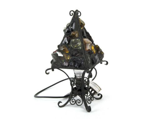 An abstract glass table lamp, the shade decorated with colourful pieces of glass within a metal frame, height 31cm