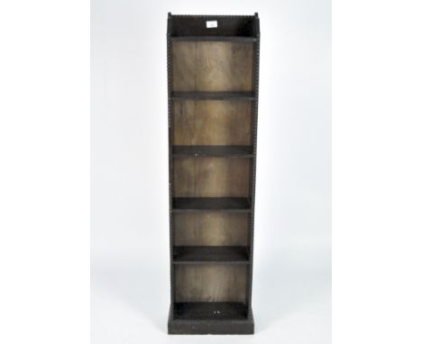 A set of Art Deco style high, narrow dark stained oak shelves with beaded edging, 128cm x 33cm x 16cm