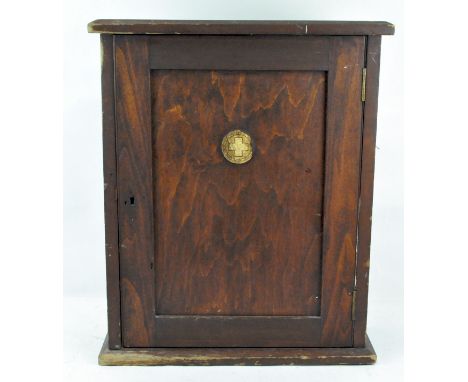 A vintage mahogany Ferrist &amp; Co of Bristol first aid cabinet, with original label to front, 58cm high