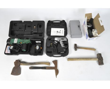 A group of tools to include an angle grinder, electric drill, a cordless power lopper, axes, and more