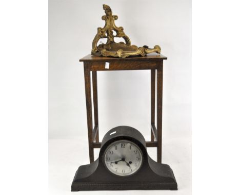 An occasional table, 57cm x 37cm x 32cm, an early 20th century mantel clock with plaque inside rear door reading 'Sanders the