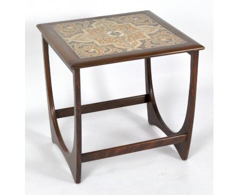 A G-Plan tile top side table inset with four brown and orange patterned tiles, 52cm x 50cm x 50cm