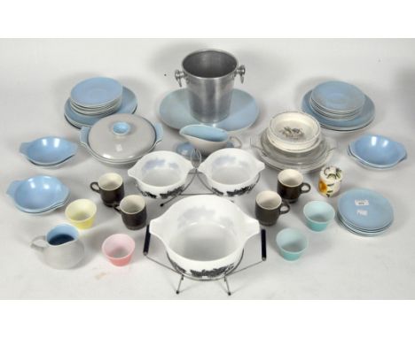 A pale blue and grey Poole pottery part dinner service with plates, turreens, sauce boat, together with Wedgewood Peter Rabbi