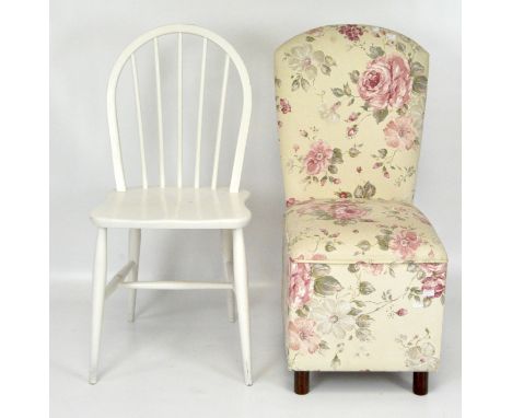 An upholstered chair with lift up seat revealing storage, 85cm high, together with a white painted stick back chair, 87cm hig