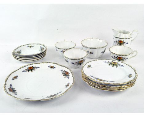 A 'Crown Chateau' china part tea service comprising cups, saucers, plates, a serving plate, jug and sugar bowl, all with prin