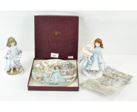 Two limited edition Royal Worcester NSPCC figurines of a girl with dolls, 'Lullaby' and a girl carrying a child, 'Love', heig
