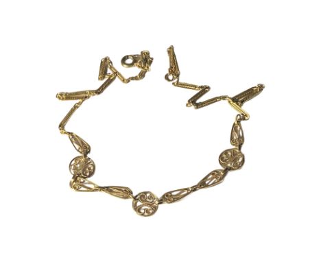 18 carat tested gold fancy link necklace. French in origin, marks on jump ring. Gross weight is approximately 10.46g. The nec