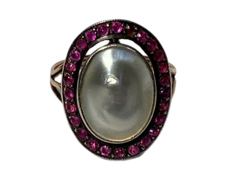 Georgian blister pearl and ruby ring. The shank tests as 18ct gold.  The mount tests as silver. The head of the ring measures