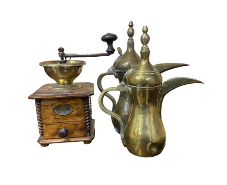 Two Ottoman Brass Dallah coffee pots together with a Peugeot c1900 Coffee Grinder.  Dallahs both carrying Ottoman marks. Coff