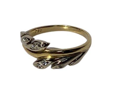 18ct yellow and white gold ring with diamond accents. Total approximate weight is 3.5g. Size N. Condition report: Good.