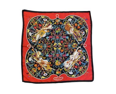 Authentic Gucci hand-rolled silk scarf. Measuring approximately 35 inches square. Good condition.
