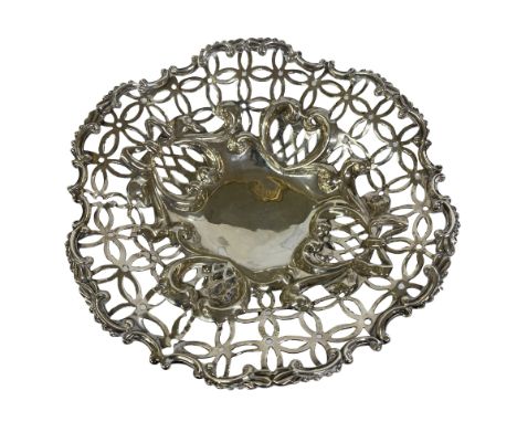 Victorian Silver Pierced Dish, 96 grams, William Hutton & Sons, Birmingham 1895.  Diameter 12.5 x 5 cms. Splits and repairs