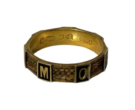 15ct Chester hallmarked Memento mori ring. Gold and black enamel. Seven panels spell Memory the 8th panel has a X in it. Betw