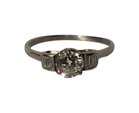 Platinum Old European cut diamond solitaire ring. Total weight of the central stone is approximately 0.70ct  The ring is flan