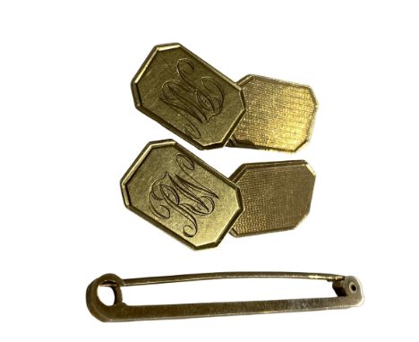 Pair of 9ct Gold Cufflinks together with a 9ct Tie Pin, combined 11.5 grams.
Both fully hallmarked. Minor surface wear. Pin l