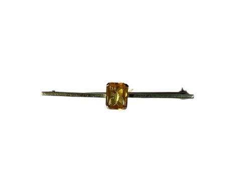 9ct Orange citrine tie pin/bar brooch with scorpion intaglio. Measuring approximately 6cm length Weight approximately 4.3g. C