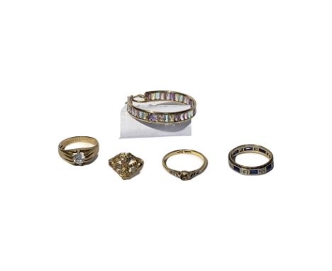 Selection of scrap gold to include. 18ct ring missing the stones total weight is approx 2.35g Three 9ct gold rings: one with 