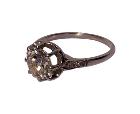 Platinum and diamond solitaire ring. Indistinguisable marks on the outside of the band but tests as platinum. Circa 1910 prob