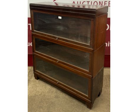 An early 20th Century Globe Wernicke mahogany three tier sectional stacking bookcase, H - 102cm W - 85cm D - 29cm