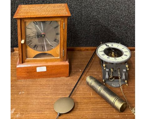 A German lantern style wall clock and a mantel clock 