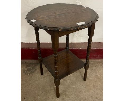 An early 20th Century oak bobbin turned occasional table 