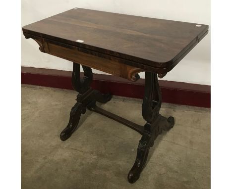 A George IV rosewood rectangular fold over card table, H - 75cm W - 92cm D - 46cm