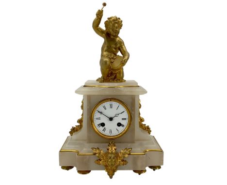 French - late 19th century 8-day polished alabaster mantle clock, break front case with ormolu mounts on a deep plinth raised