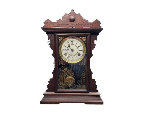 Seth Thomas - American late 19th century mantle clock with a decorative oak case and fully glazed door with visible pendulum 