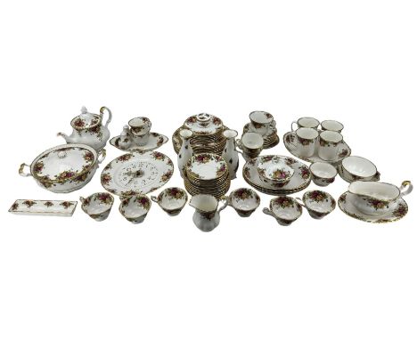 Collection of Royal Albert Country Roses, comprising a wall clock, teapot, milk jug and sugar bowl with various teacups and s