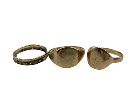 Two 9ct gold signet rings and an eternity ring, stamped 9ct (3)Condition Report:Approx 8.8gm gross, eternity ring cut