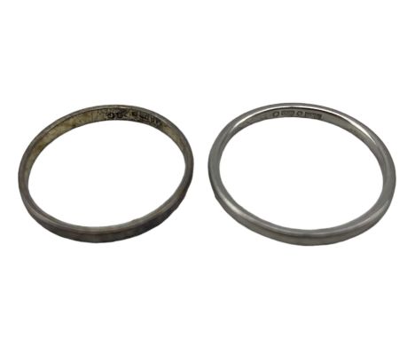 Platinum wedding ring, hallmarked and a 9ct white gold wedding ring, hallmarked (2)Condition Report:Platinum ring approx 2.2g