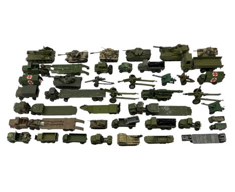 Quantity of playworn die cast military vehicles mainly Dinky including tanks and transporters, ambulances, wagons, American g