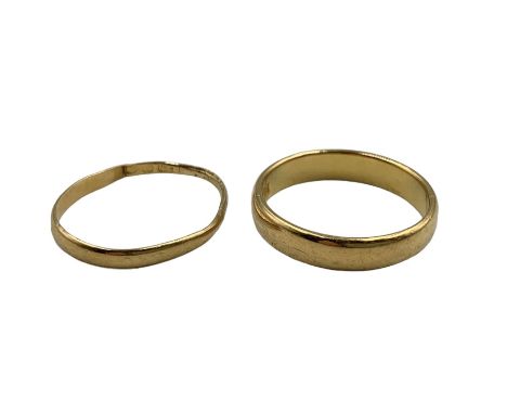 22ct gold wedding ring, hallmarked, together with another wedding ring, partially hallmarked (cut) (2)Condition Report:Approx