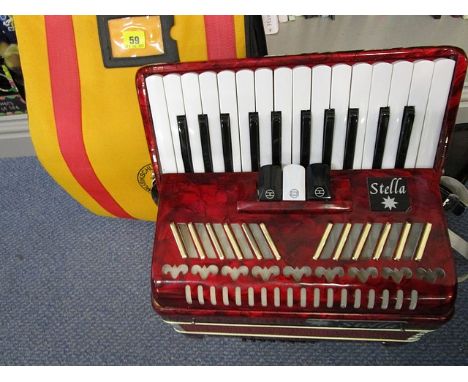 A Sella accordion in a canvas case