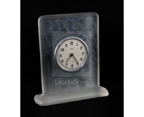An R. Lalique Marguerites no. 251 mantel timepiece, moulded and with blue stained flowerhead design, moulded mark R. Lalique,