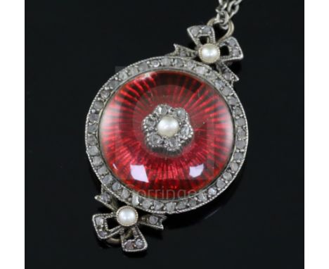 A Victorian gold, red guilloche enamel, seed pearl and rose cut diamond set circular pendant, with ribbon bow surmounts (enam