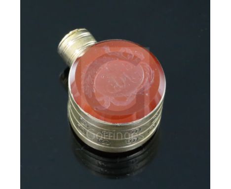 A small 19th century engraved gold and carnelian set moon shaped scent flask, one carnelian carved with initials in oval cart