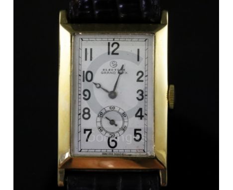 A gentleman's stylish late 1920's 18ct gold Election Grand Prix manual wind wrist watch, the curved rectangular case with Ara