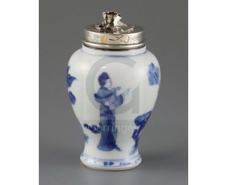 A Chinese blue and white baluster jar, Kangxi period, painted with two ladies in a rockwork garden, with later Dutch? white m