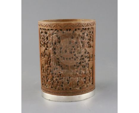 A Chinese bamboo brush pot, 19th century, carved in high relief with a large rectangular panel of figures amid pavilions and 