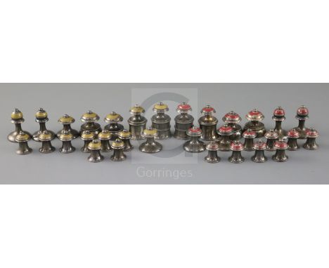 An 18th century Muslim (possibly Persian) white metal and stained wood chess set, with enamel, yellow and red bands, kings 1.