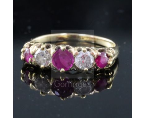 A gold, three stone ruby and two stone diamond set half hoop ring, in Tessier, Bond Street box, size M