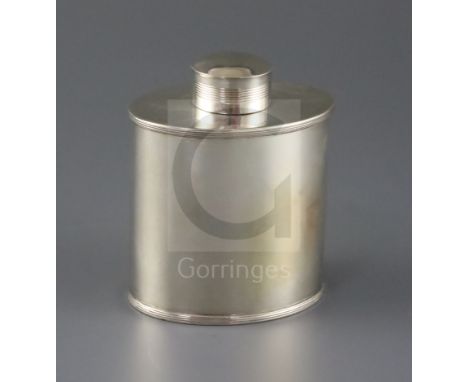 A George III silver oval tea caddy, by Soloman Hougham, with reeded border and cover, London, 1803, height, 10.3cm, 5.5. oz.