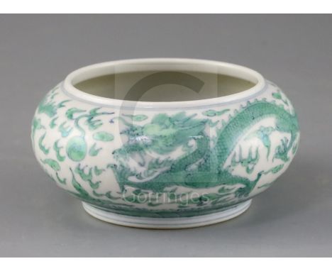A Chinese doucai 'dragon' pot, Kangxi mark but later, the dragons chasing a flaming pearl picked out in green enamel, Diam.12